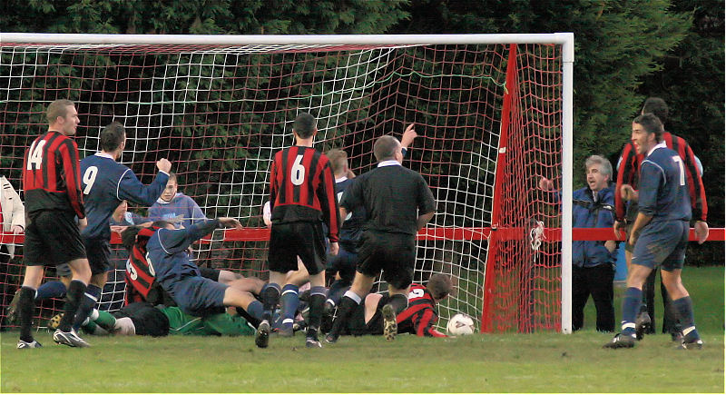 ... and he pokes the ball home for his 2nd. Paul Hodder (14) and Dave Sharman (6) can only watch as Dave Walker and Lee Farrell celebrate while Olli Howcroft (5) and Barry Pidgeon (5) sit it out on Tom Rand
