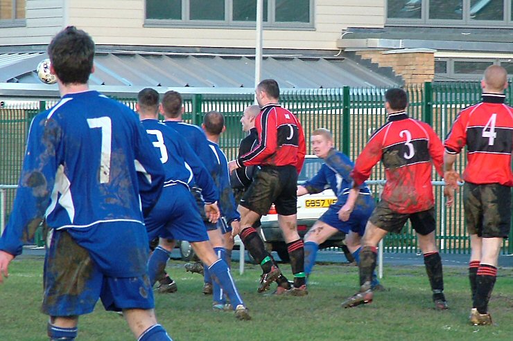 Ifield Edwards keeper Gary Newman clears another Rustington attack
