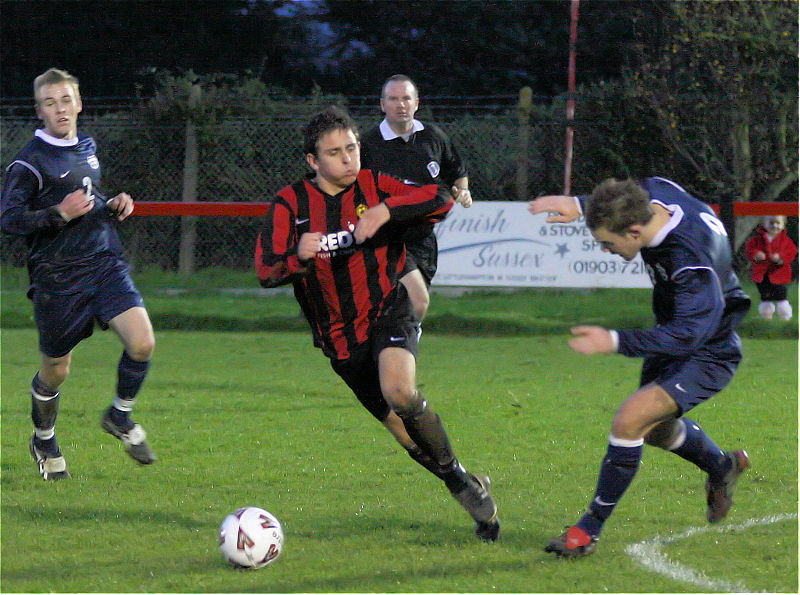 Marc Cooper about to be tackled by Chris Green
