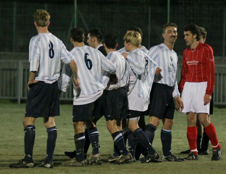 Worthing United form a defensive wall ...
