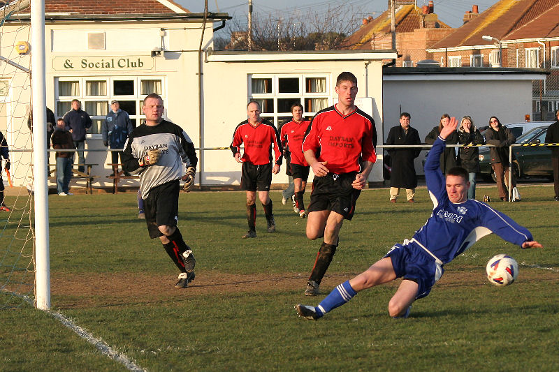 Mike Hatch throws himself at the ball
