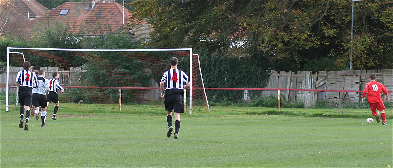 Steyning's Greg Hearne (10) catches Rangers defence napping to score in the 3rd minute

