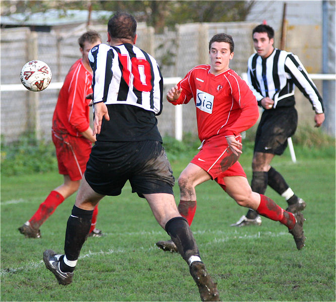 Mark Enticknap (10) blasts the ball towards goal ...
