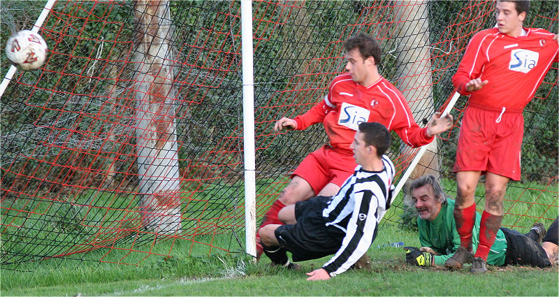 ... and he looks relieved as Ryan Pratt clears off the line with Elliott Butler sliding in
