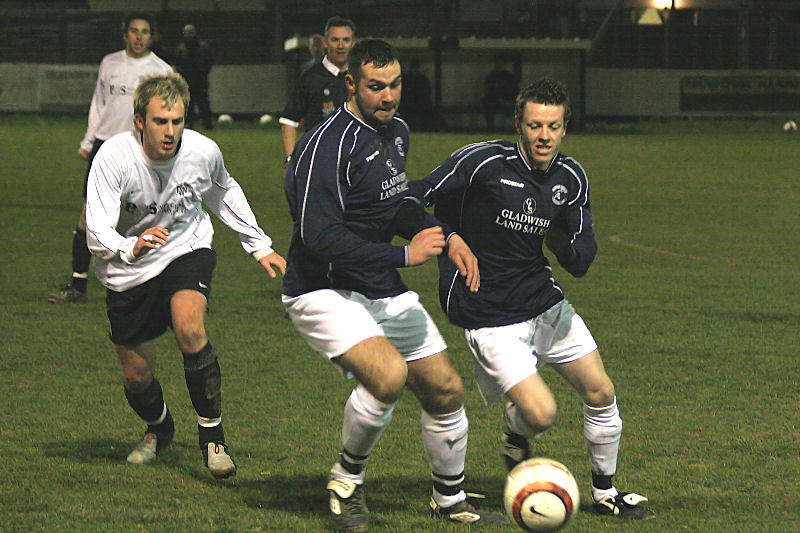 YM's Ali Russell and James Grant on the ball with Josh Biggs coming in
