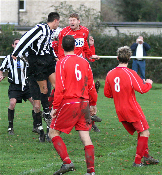 Chris Cook and Steve Duffett ?? go for a header watched by Gareth Dutton (6) and Chris Pearson (11)
