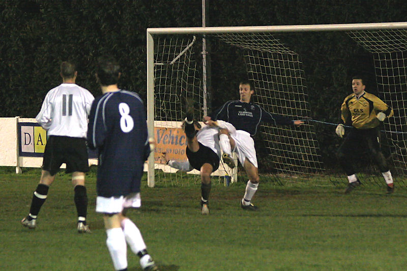 Josh Biggs tries an acrobatic shot on goal
