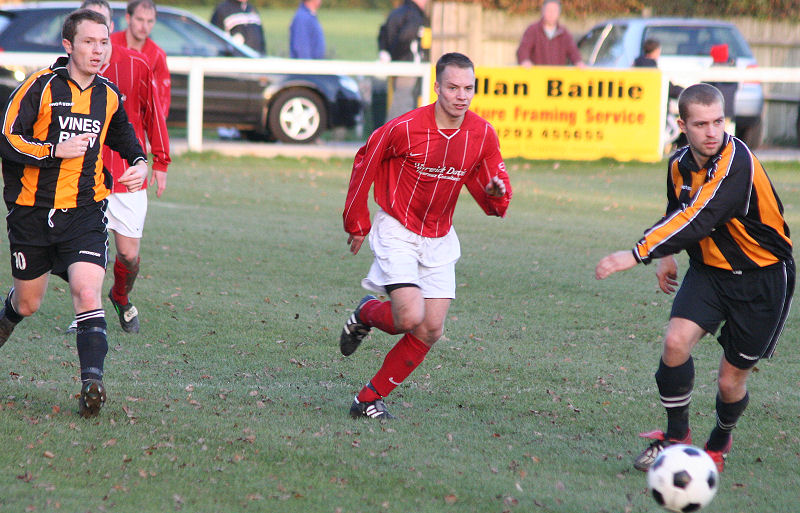 Nick Flint, Matt Huckett and Alex Bacon on the ball
