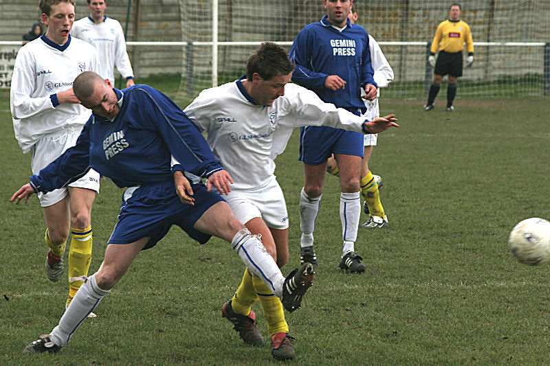 Shoreham's Robbie Craven wins this tussle with Adam Simpson (?)
