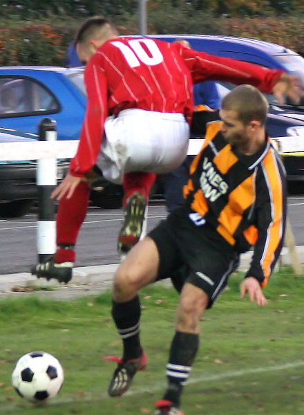 Matt Huckett (10) tackled by Alex Bacon
