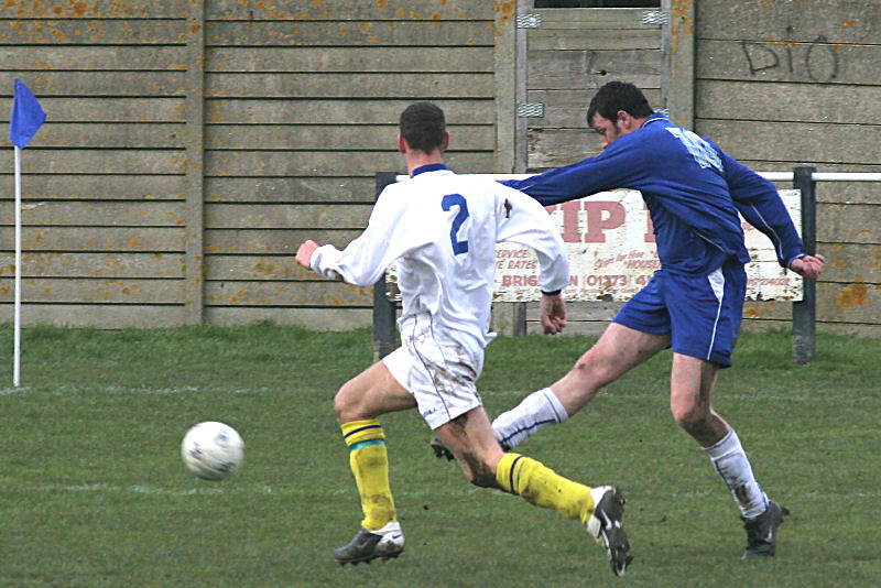 Martin O'Donnell (10) beats Nick Humphrey (2) to get a cross in
