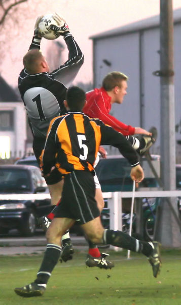 Alan Mansfield takes a catch with Danny Attwater backing up
