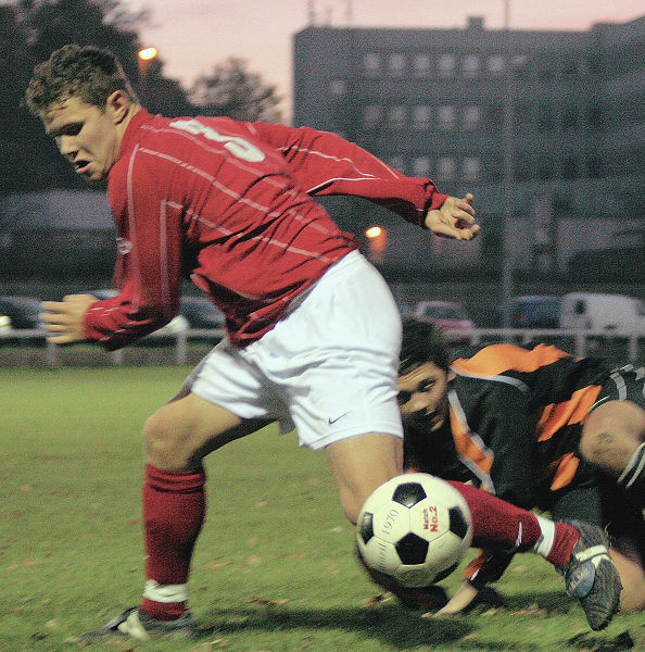 Lloyd Walker cuts the ball out
