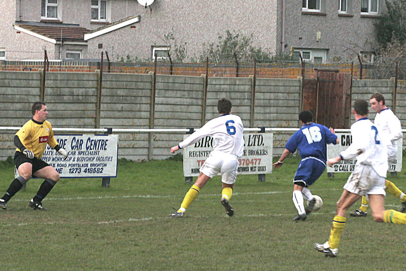 Shoreham new boy Seb Kazemi (16) gets into the action
