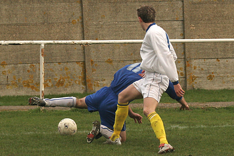 Christian Troak is tackled by Phil Williamson
