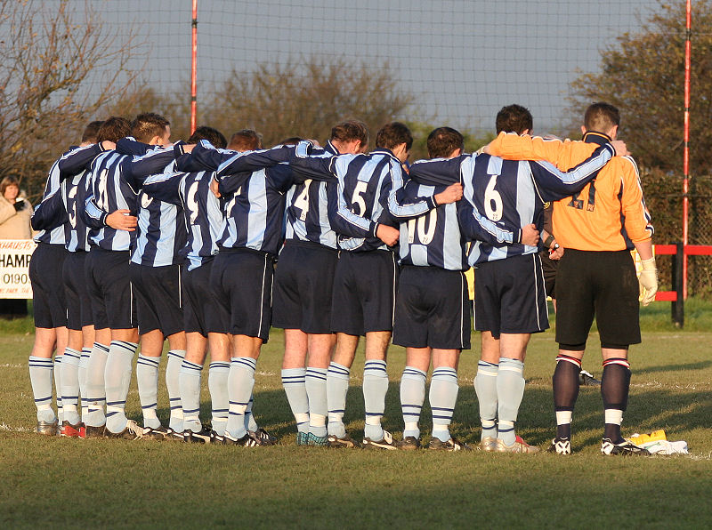 Officials and players from both teams ...
