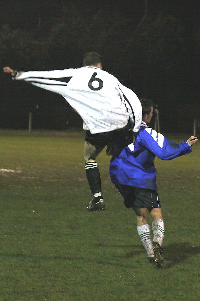 Mike Huckett climbs high to win the ball
