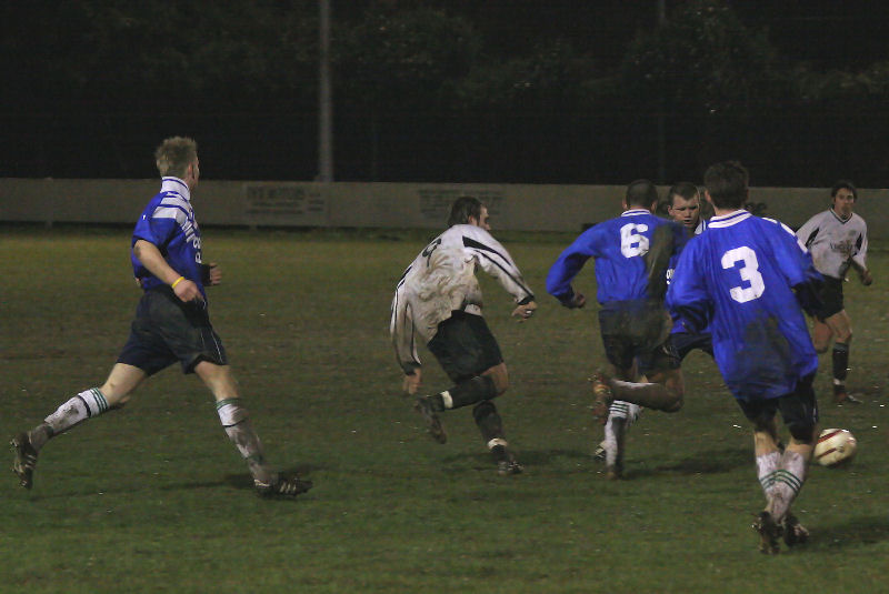 Paul Thomas on the ball with Pete Robertson (6) and Mark Jackson (3)
