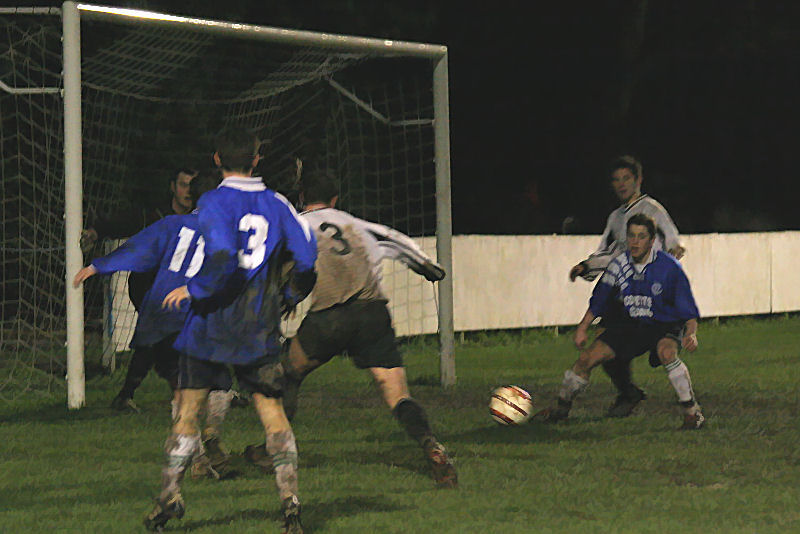 Scott Murfin (11), Mark Jackson (3) and Andy Appleton (3) scramble for the ball 
