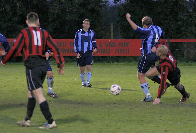 Chris Steward gets the ball away from Kane Evans
