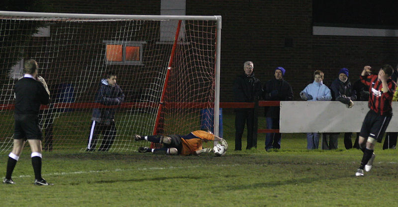 ... Peter Newstead saves Hassan Yassan's shot ...
