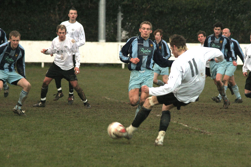 Dan McLaughlin puts the ball into the box ...
