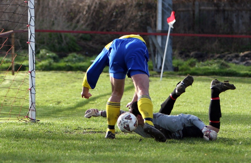 Tony Miles flicks home a goal for Lancing
