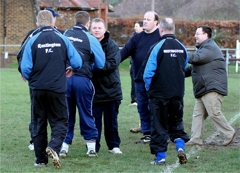 Rustington's unbeaten run is over. Gareth Davies congratulates Paul Sargeant
