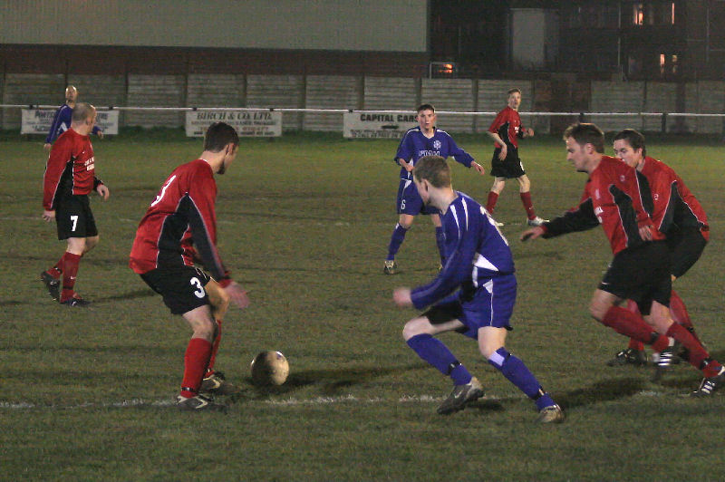 Matt Michaels (3) gets the ball away from James Highton
