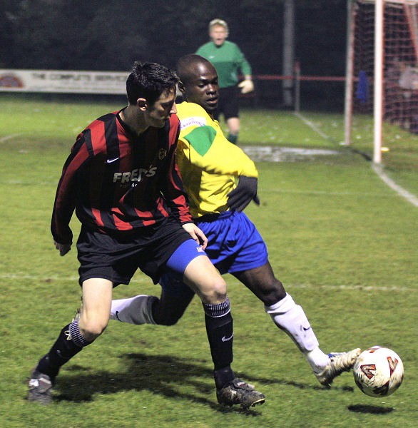 Dave Sharman close up on Manny Omoyinmi
