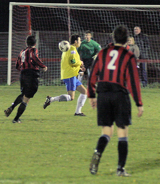 Marc Cooper (8) tries a shot
