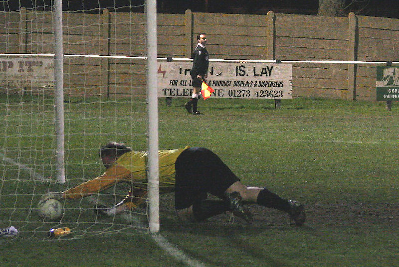 ... and Graham Leach is beaten for Rustington's goal..
