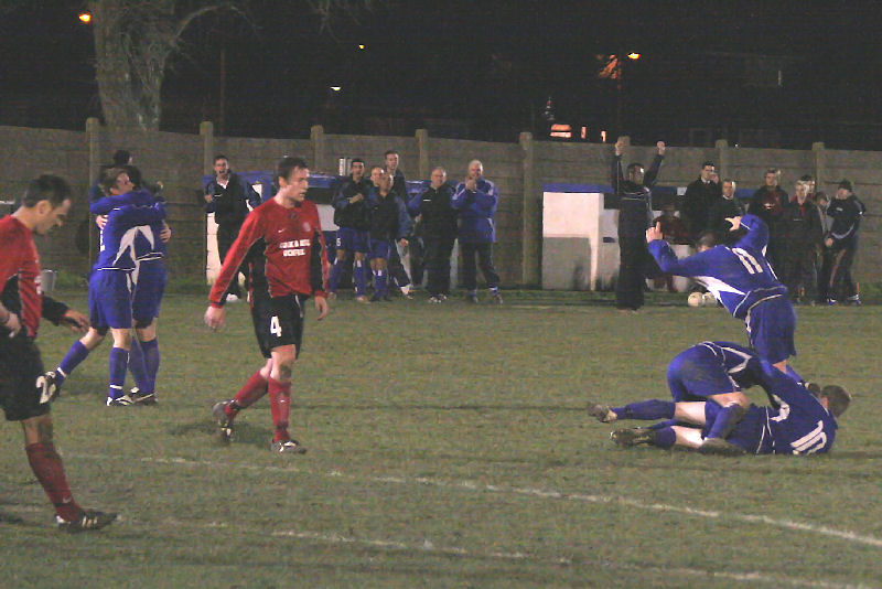 ... and James, Ollie Rowland and Craig Cox start the celebrations...
