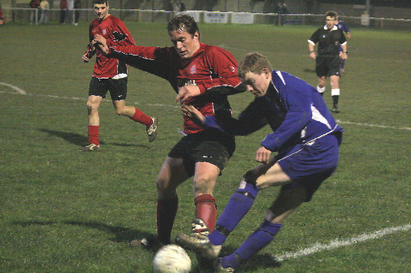 James Highton is tackled by Mark Chalk
