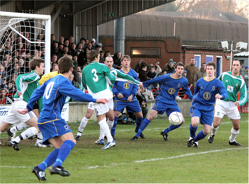 An early scramble in the Hendon goal mouth
