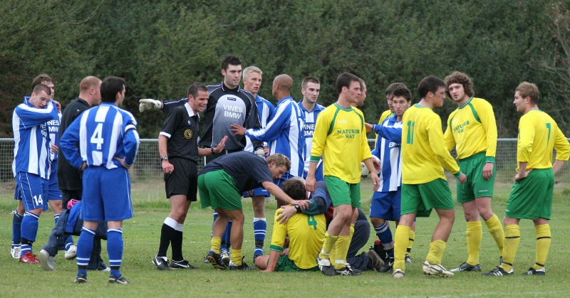 Ricky Mullen receives treatment for a nasty facial injury
