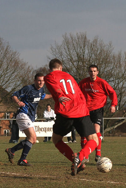 Danny Curd turns to get a shot in
