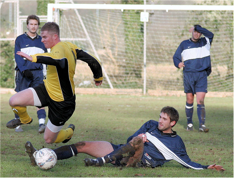 Andy Smart is tackled
