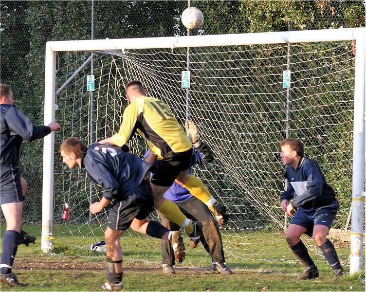 A late effort from Rustington's Nathan Racine goes just over
