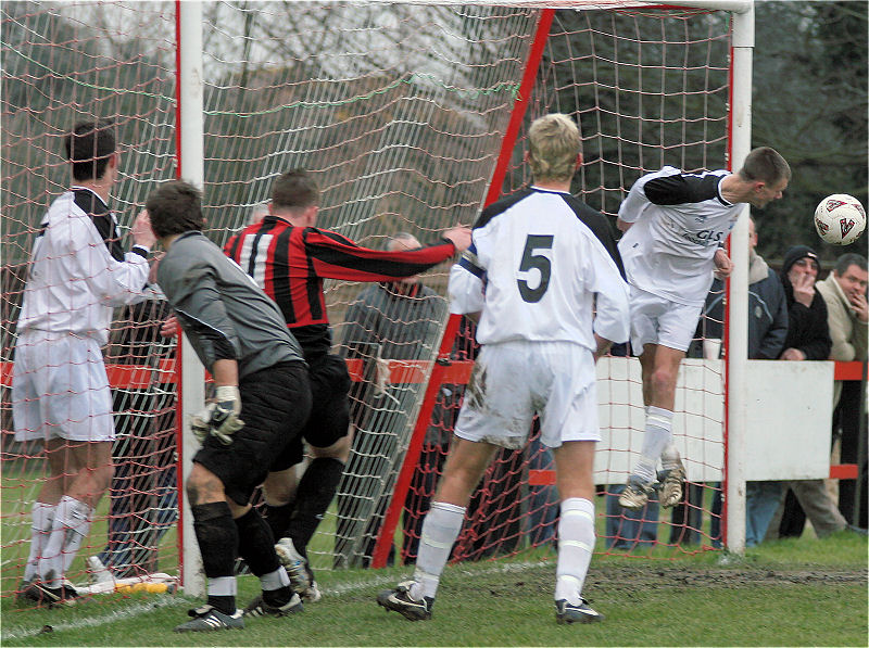 ... and the ball goes out for a corner
