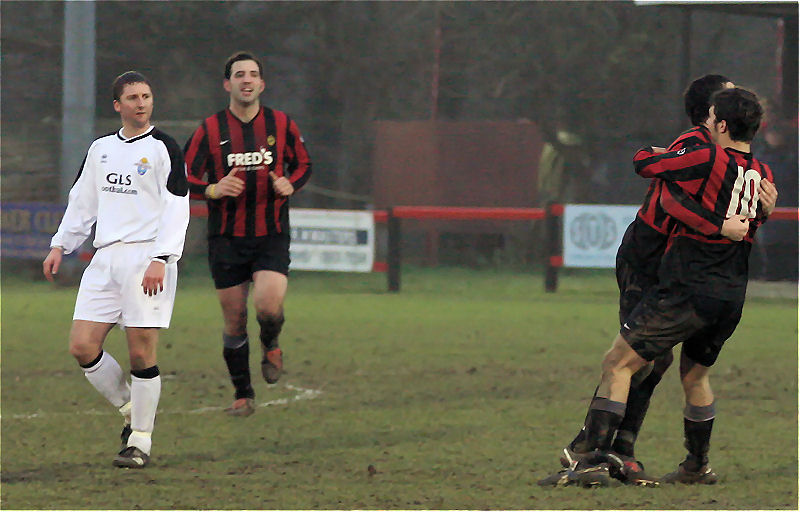 Marc Cooper opens the scoring for Wick and is congratulated by Tom Manton (10)
