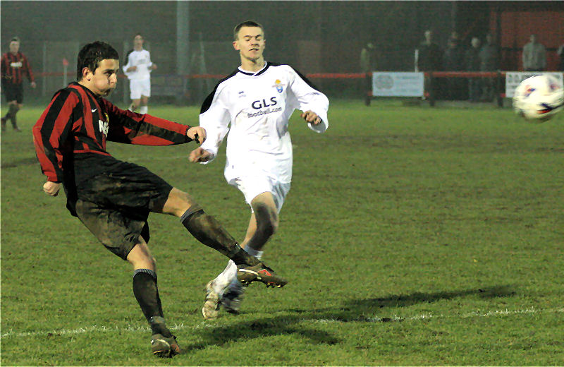 Marc Cooper blasts a shot just over the bar
