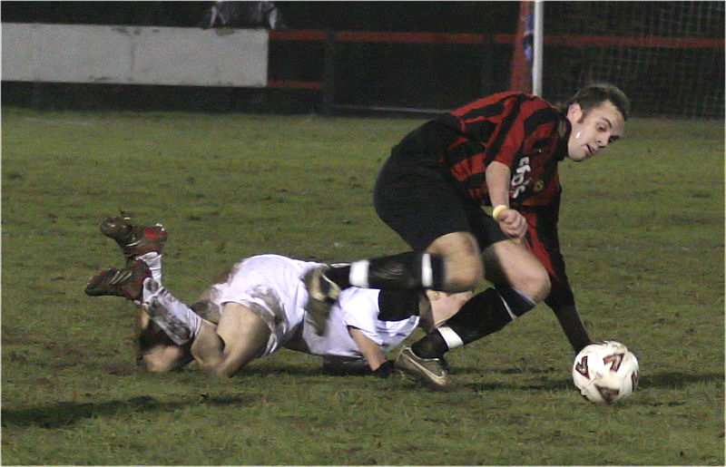 Mike Duffell brings the ball away from a tackle
