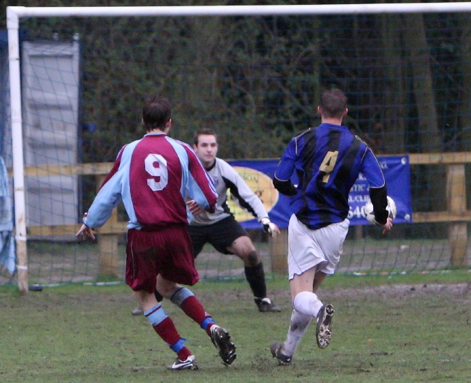 Lewis Hole (9) slots home Little Common's third goal ...
