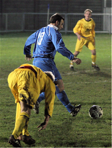 Miles Scerri (10) beats a tackle
