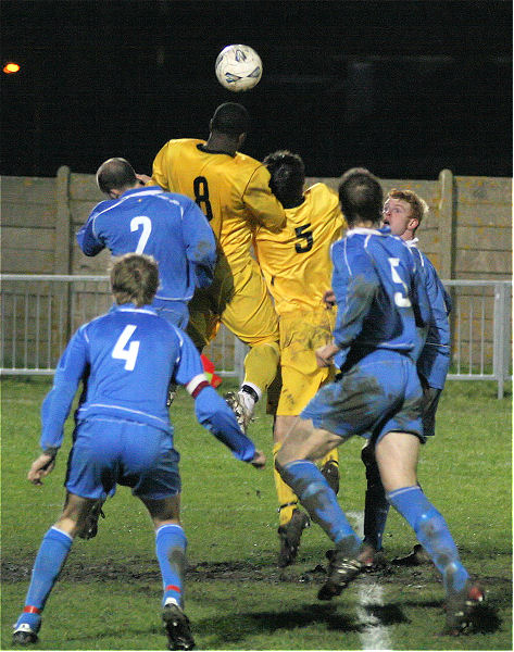 Richard Pacquette outjumps the Shoreham defence ...
