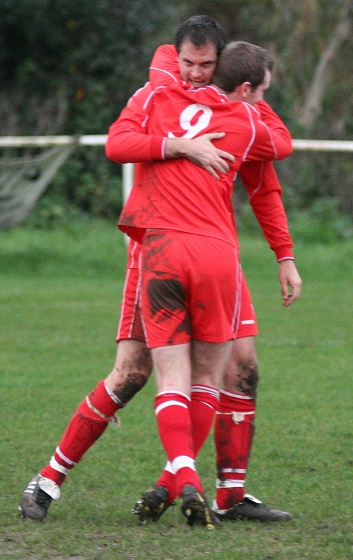 ... and scorer James Hall is greeted by Michael Azzopardi
