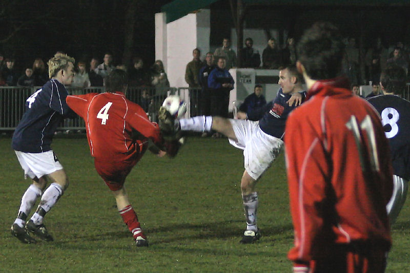 Lee Andrews (4) and Andy Johnson ? attempt to win the ball
