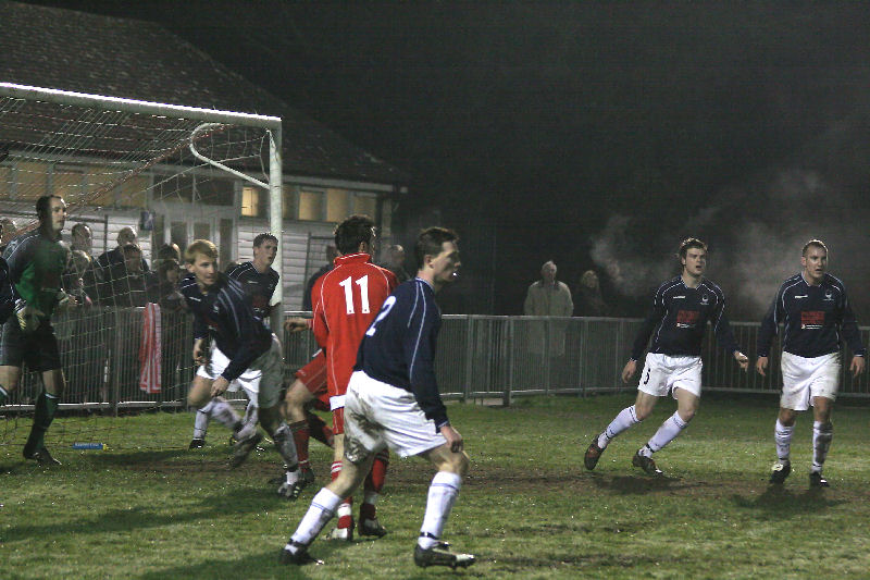 A second half scramble in the Wealden goal mouth is cleared
