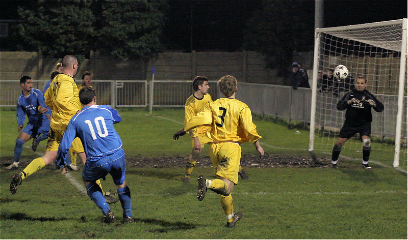 Miles Scerri (10) hits the side netting
